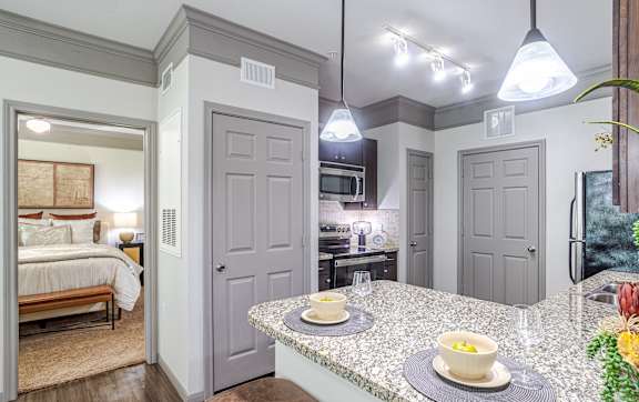 Living room and kitchen at Avenues at Shadow Creek Ranch Apartments, Pearland, 77584