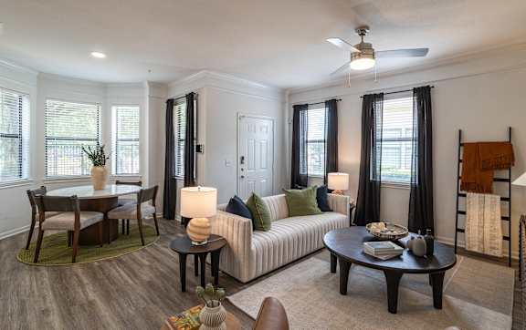 Living room with windows and blinds at Grand Villas at Cinco Ranch, Texas