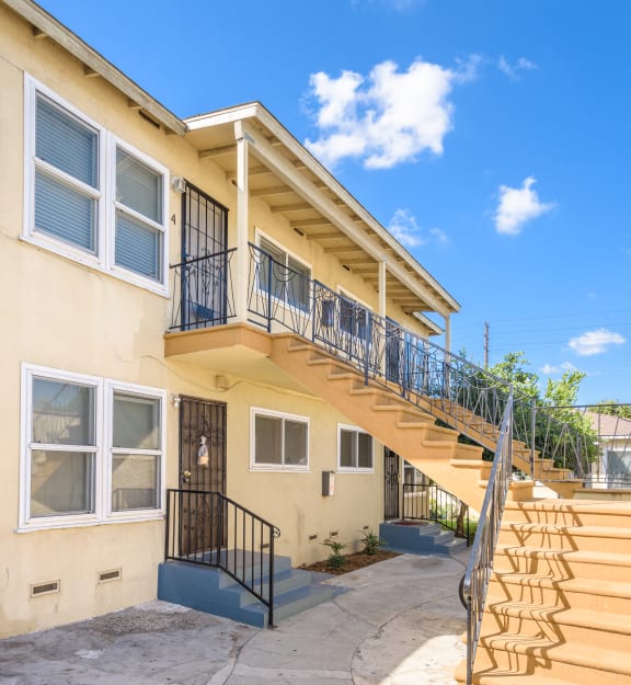 a building with a staircase and a staircase in front of it