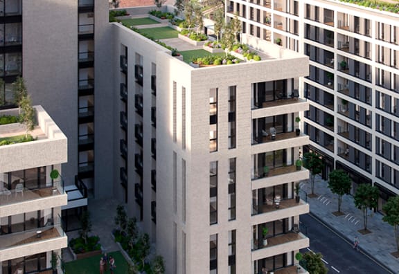 a rendering of a building with a green roof