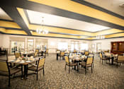Thumbnail 9 of 31 - A large dining room with tables set for dining.
