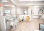 Thumbnail 27 of 29 - Baby Room at Spring Arbor of Wilson, Wilson