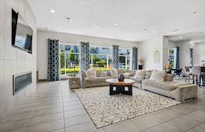 A modern apartment complex with a well-maintained courtyard.