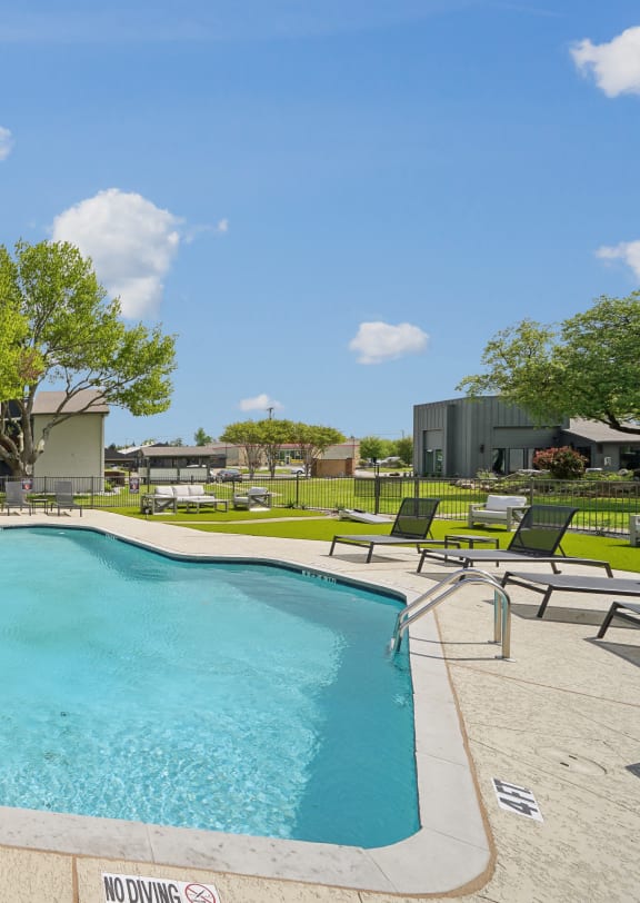 our apartments have a resort style pool with lounge chairs
