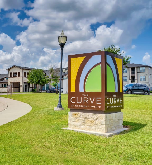 the cure care sign at the cure at cedar point apartments