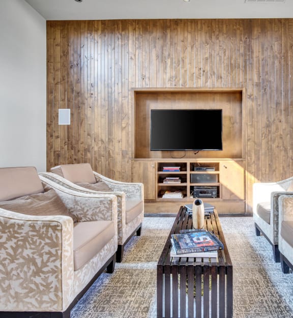 a living room with couches and a television