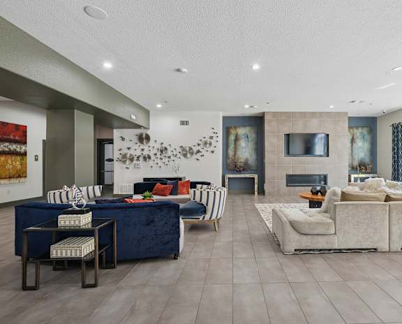A modern apartment complex with a well-maintained courtyard.