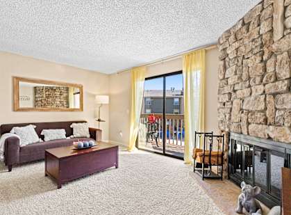 Model living room at Silver Reef Apartment Homes in Lakewood, CO
