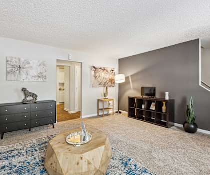 a living room with a couch and a coffee table