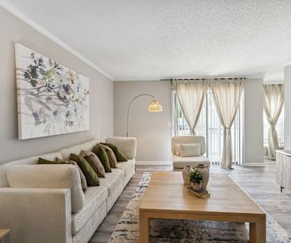 a living room with a couch and a coffee table
