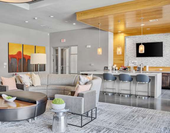 a living room with a couch and a table