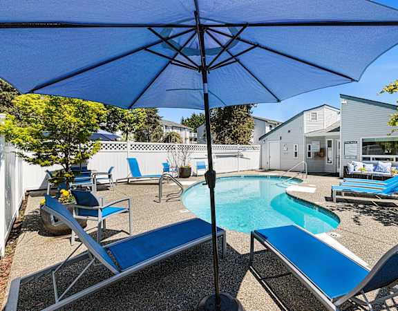 take a dip in the pool at the enclave at woodbridge apartments in sugar land, tx