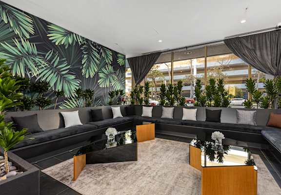 a living room filled with furniture and a large window at The View, California, 90005