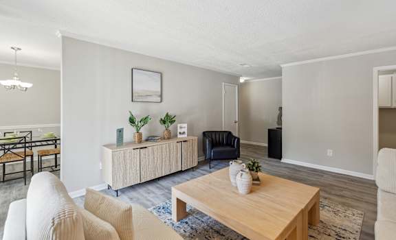 a living room with a couch and a table