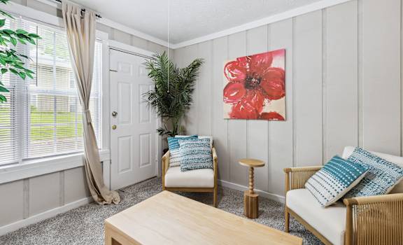a living room with two chairs and a table at Linden Ridge, Stone Mountain, GA, 30083