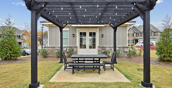 an exterior view of a home with a walkway and a driveway