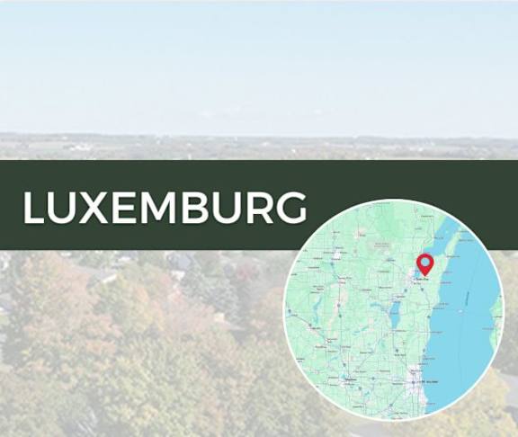A map with a red pin marking a location on it.