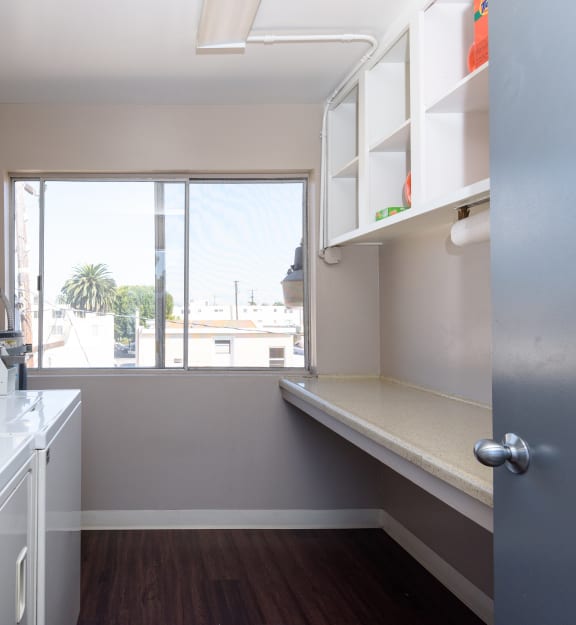 this is a photo of the laundry room in a 1 bedroom apartment at deer hill apartments in