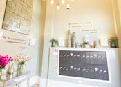 Thumbnail 2 of 11 - Mail room with mail boxes and geometric chandelier