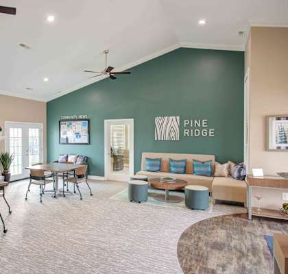 Living Area with Fireplace and Seating at Pine Ridge Apartments, Rochester Hills, MI, 48307