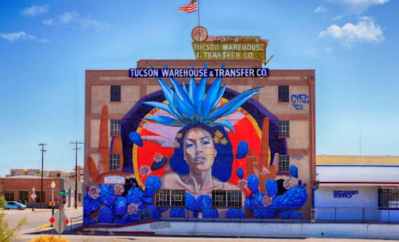 a large mural on the side of a building at Promontory, Tucson, 85704