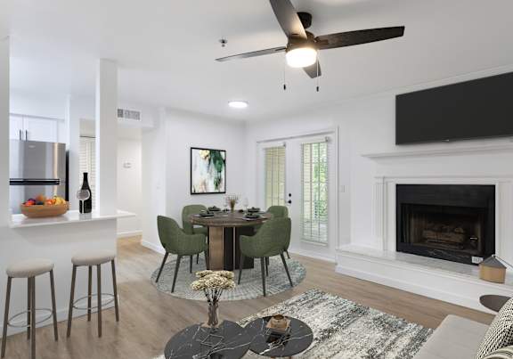 A modern living room with a fireplace and a television mounted above it.