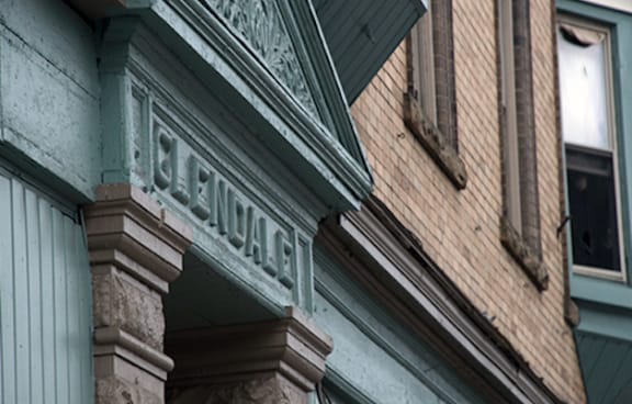 brick and green stone glendale apartment building at 76 Grant Street, Buffalo, NY