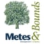 A logo with a tree and the words Metes and Bounds.
