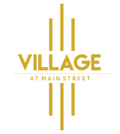the logo for the village at main street