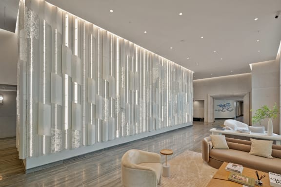 a living room with a view of the nyc skyline  at Riello Apartments Owner LLC, NJ, 07020