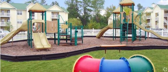 a playground with a slide and monkey bars