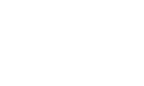 A white building with the letters BCCL on a black background.