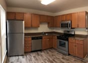 Thumbnail 8 of 25 - Kitchen With Ample Storage at The Apartments at Wellington Trace, Frederick, 21703
