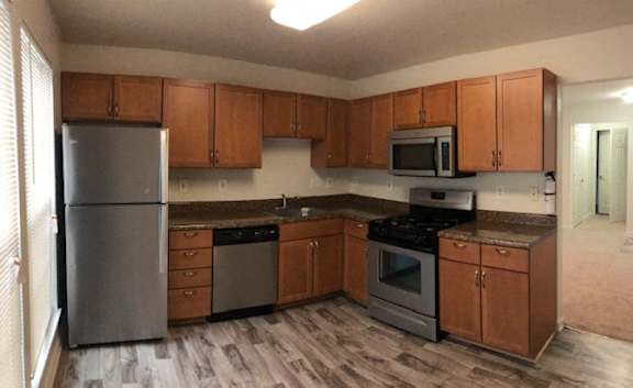 Kitchen With Ample Storage at The Apartments at Wellington Trace, Frederick, 21703