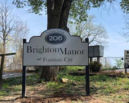a sign for brighton manor at fountain city