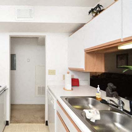 a bathroom with a sink and a toilet and a shower