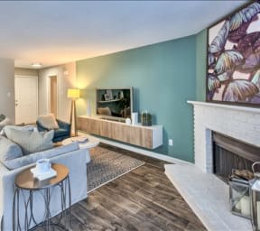 a living room filled with furniture and a fire place