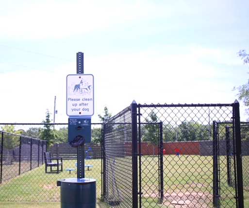 Fenced dog park at 71 at Tulsa Hills Dog Park. 