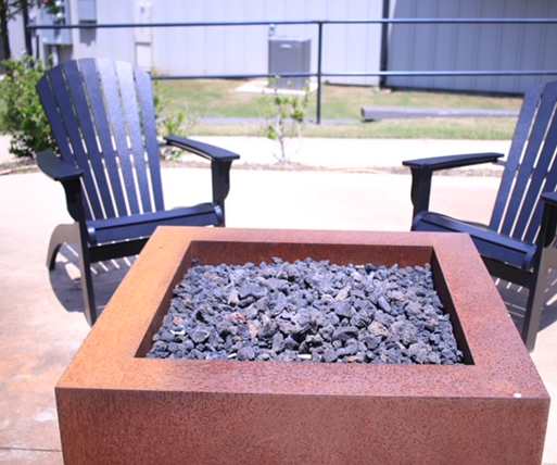 Fire pit with seating at 71 at Tulsa Hills Outdoor Seating 