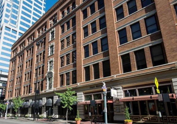 a large brick building on a city street