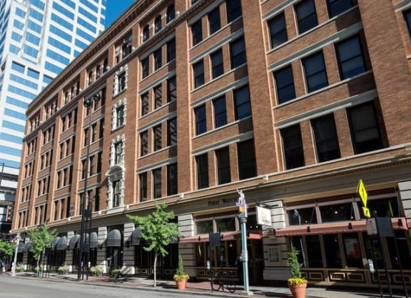 a large brick building on a city street