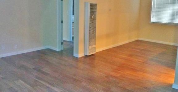 bedroom with wooden floors