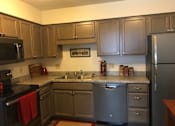 Thumbnail 7 of 17 - Fully Equipped Kitchen at Park Place Apartments, Coralville, IA 52241