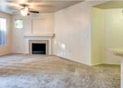 Thumbnail 15 of 24 - Ingleside Apartments Living Room with wall to wall carpet and fireplace
