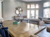 Thumbnail 7 of 24 - Ingleside Apartments Clubhouse dining table with blue wooden chairs