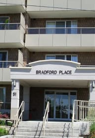 Exterior of Bradford Place surrounded by flowers and plant life