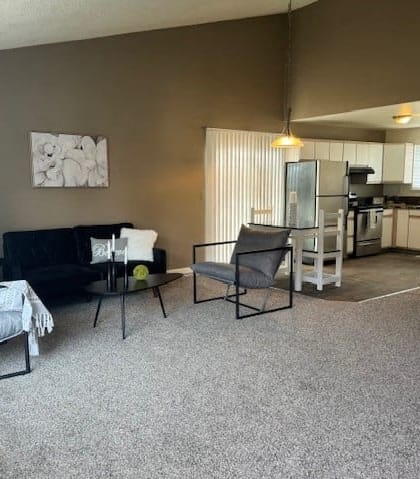 a living room with a couch and a table