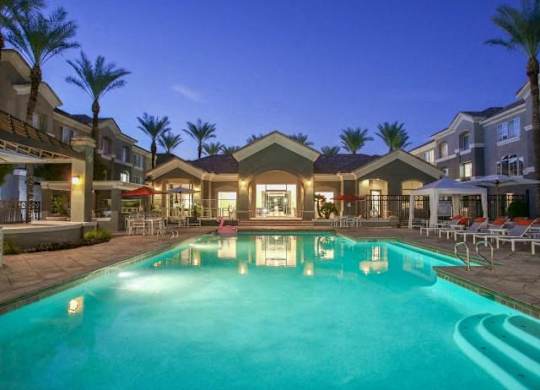 The Highland Apartments Clubhouse pool at sunset