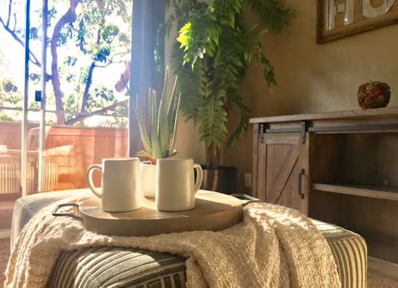 Comfy living rooms at The Oaks Apartments, Upland, California