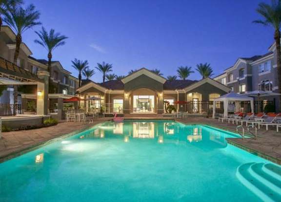 The Highland Apartments Clubhouse pool at sunset